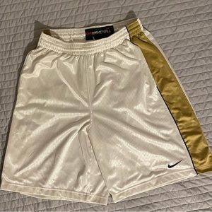 Nike white and gold basketball shorts